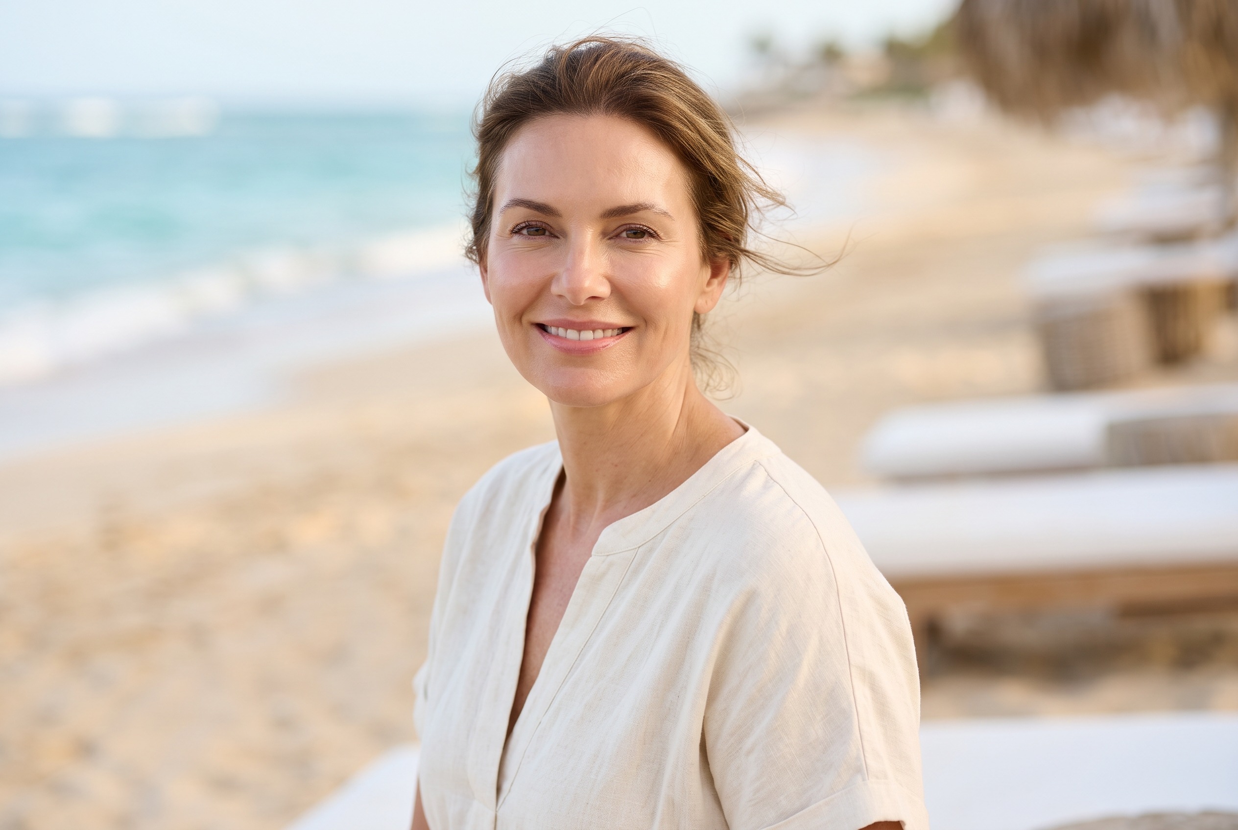 Woman in her 40s with hydrated, radiant skin
